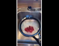 Collab Kale Salad IG - Woman pours drink through strainer down sink