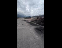 Man shows aftermath of wildfire on neighborhood 