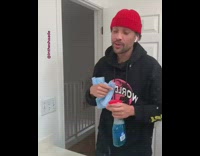 Red beanie guy wipes mirror clown costume 
