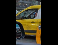 Collab WINY - Man casually drums while driving on road