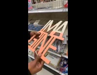 Guy reads imagine sign wrong 