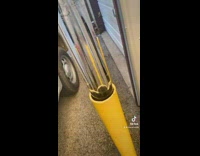 Guy pulls out frozen ice mold in parking pole and breaks it 