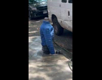 Collab WINY - Fire hydrant covered with blue puffer jacket