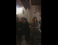 Woman surprises unsuspecting mother with hug