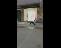 Guy sits on chair on onewheel 