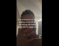 Shirtless guy wakes up and opens curtain blinds and goes outside 