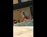 Girl takes photos at the pool