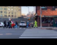 People in costume walk on the street