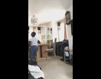 White shirt guy drinks water dances barefoot