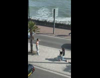 Woman bra jeans middle of street pictorial beach