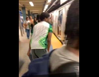 Collab Subway Creatures - Two guys carry sofa into the train