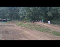 Three different vehicles do dirt road course jump