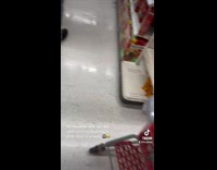 Guy laughing at little girl on leash in target 