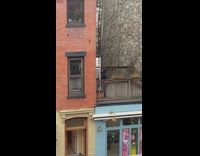 Guys climb over balcony with couch pt. 5