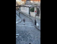 Two women photoshoot on the small street