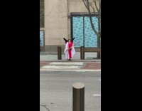 Guy wears jesus costume with sword 