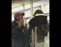 Guy lady argue on subway religion bible 