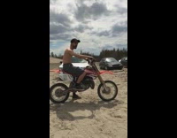 Guy falls off red dirt bike does scorpion 