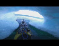 Guy paddles kayak through ice tunnel lake 