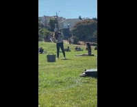 Girl yellow dress boots heels crowded park