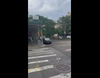 Giant inflatable rat on pickup truck street