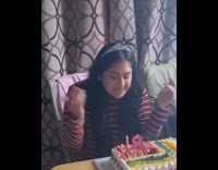 Girl throws up middle finger birthday 