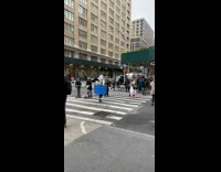 Person in blue box dressed up as tampons