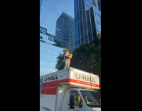 Collab winy - Guy plays music on top of truck