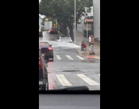 Collab winy - Man washes car with broken fire hydrant