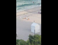 Woman lay beach switch place with friend