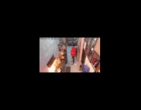 Woman cook food got pan on fire footage