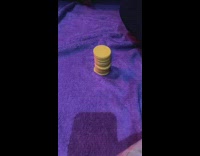 Person put red chips over yellow chips knocked over