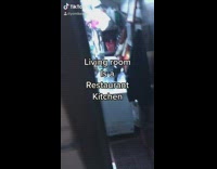 Guy shows one bedroom apartment restaurant kitchen 