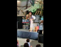 Man Plays as Impersonator and Puppeteer at Fair Show