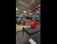 Man wear Boba Fett helmet do deadlift gym