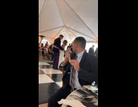 Collab Kale Salad IG -  Guy butters his bread during wedding dance