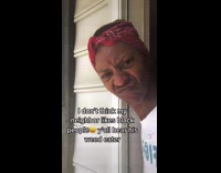 Lady looking out window makes faces at noise 