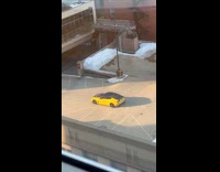 Man parks yellow car and took a picture of it