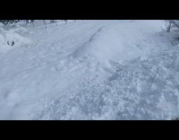 Guy on hoodie jumps on deep snow