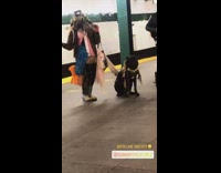 Guy dances to electric guitar subway platform 