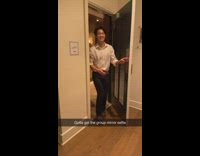 Group of guys walk into room through door