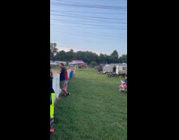 Collab IITW - Two men poses beside the old tractor