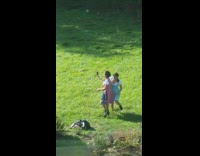 Two girls selfie checkered dress red tractor 