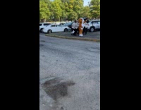 Collab WINY - Mascot dances with guys at parking lot