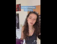 Black shirt girl young substitute teacher notebook 