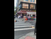 Shirtless guy walks around street in thong 