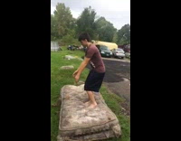 Guy attempts back flip off dirty mattress