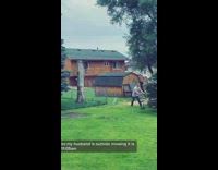 Men in neighborhood mow lawns at same time 