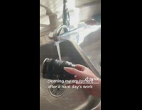 Lady Pulls Lens-Shaped Cup then Washes it