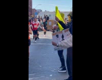 Runners eats fries after crossing 20K marker